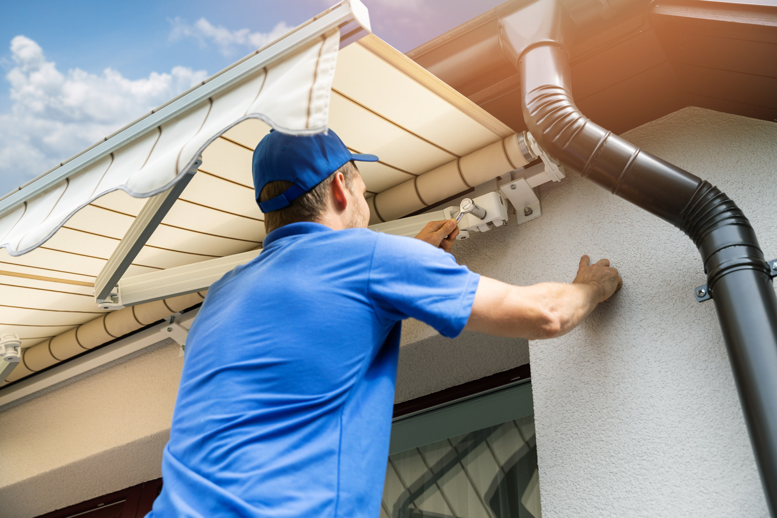 Man Installing an Awning