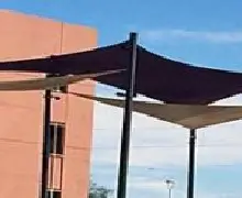 Sail shades attached to poles at park in Mesa, AZ