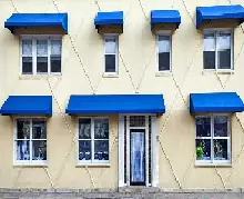Awnings on building painted blue