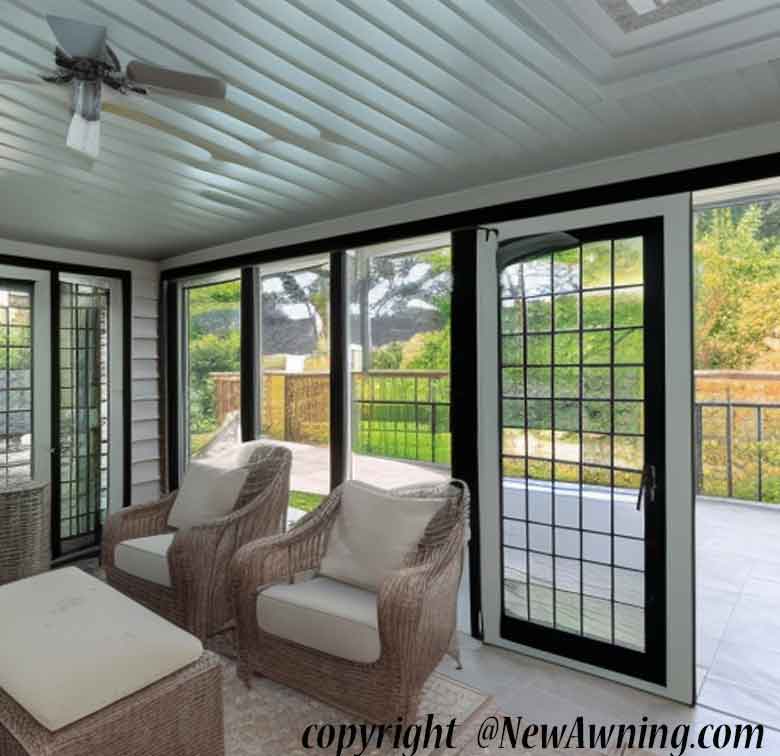 sunroom with wicker furniture and deck
