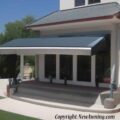 fabric awning cover over solar panels to protect from storm damage