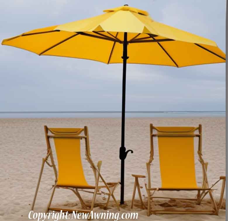 yellow beach umbrella sand chairs